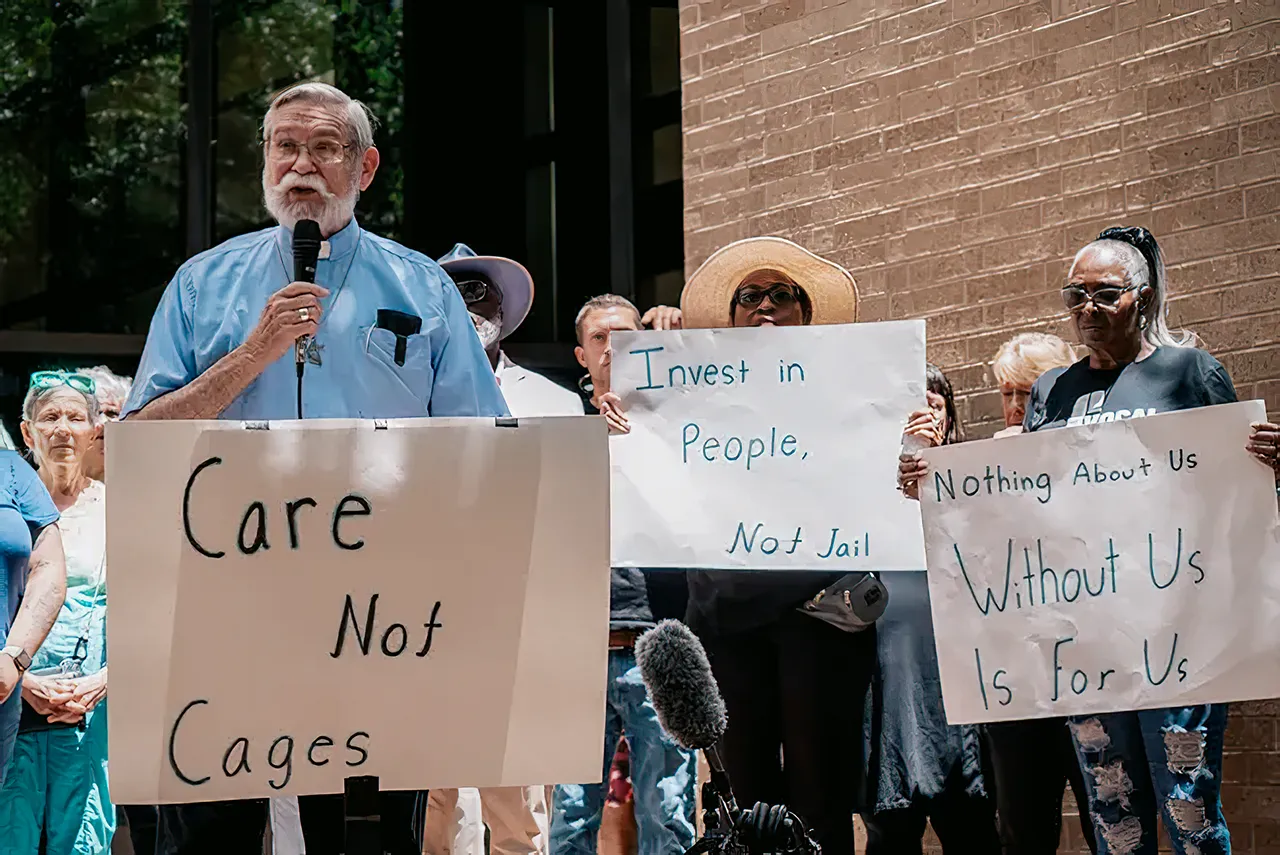 Advocates holding signs for social justice